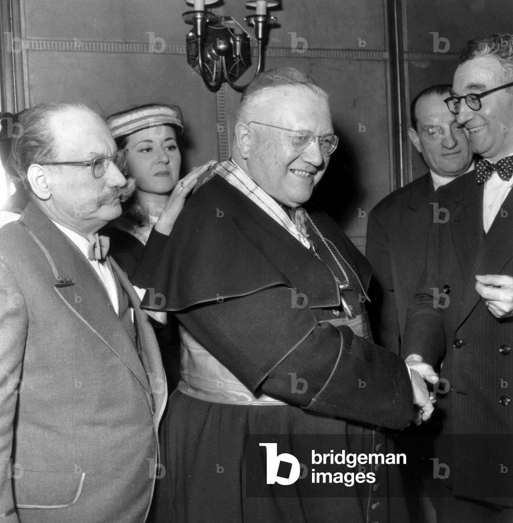 Cardinal Maurice Feltin Receiving The Cross of French Courtesy Knight With on Right Marcel Ranville, (Member of The Order), on Left Valensi and in The Background, Raymond Rodel on January 21, 1956 (b/w photo)