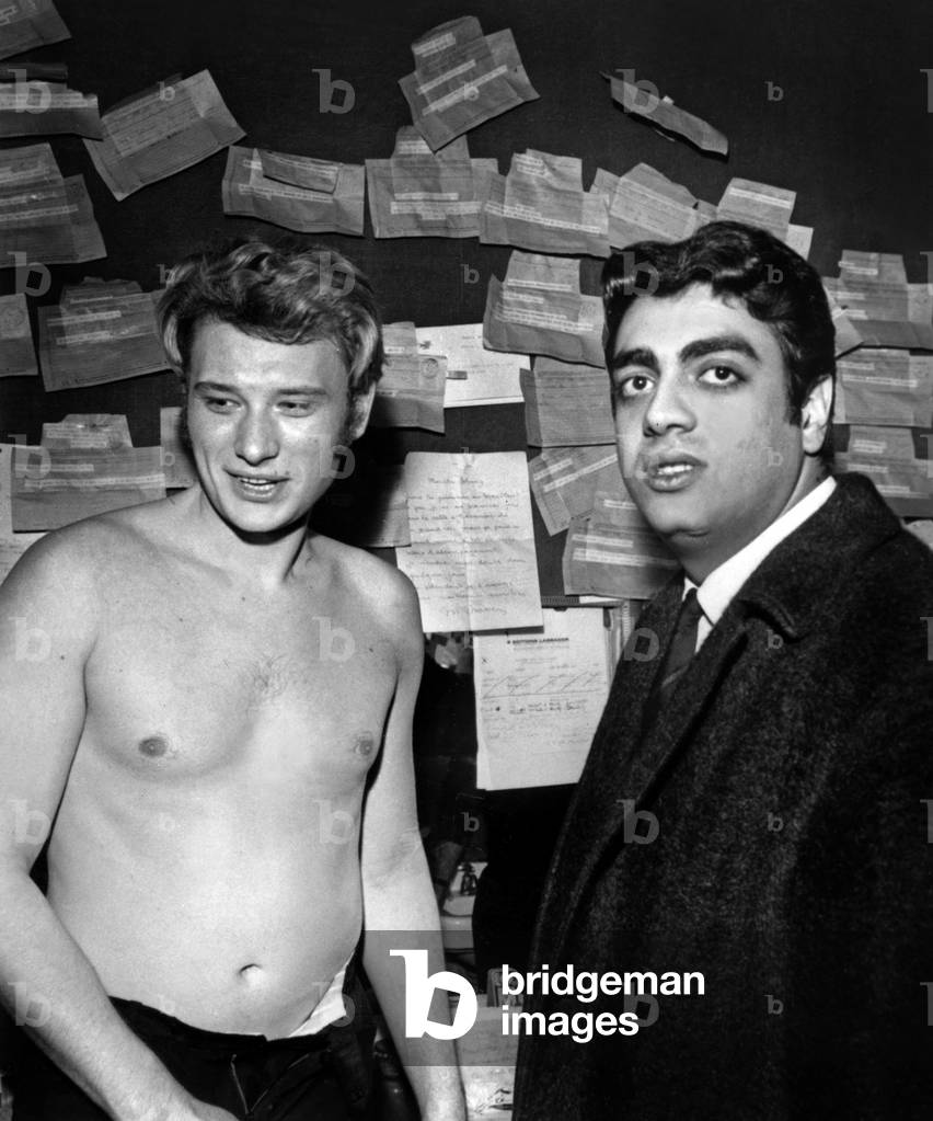 Singer Enrico Macias Congratulating Johnny Hallyday After his Show in Olympia December 26, 1965 (b/w photo)