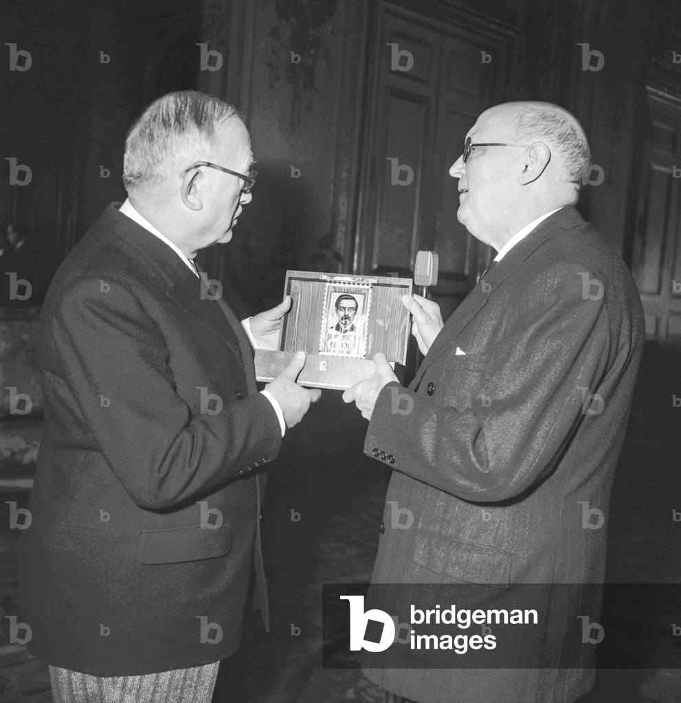 Georges Duhamel showing the new stamp against tuberculosis to French president Vincent Auriol at the Elysee, Paris, November 15, 1951 (b/w photo)