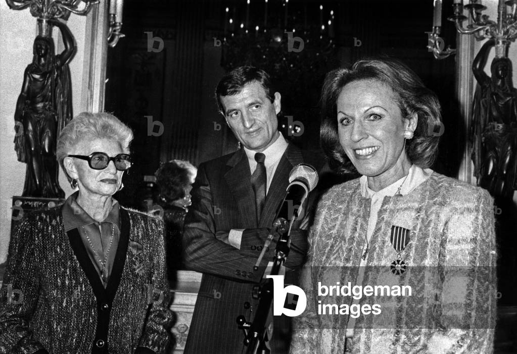 Paulette Cofourx (Knight In The National Order of Merite) And Her Daughter Patricia Cofourx (Knight of Arts and Letters) Here After Having Collected Their Decoration From The Hands Of Francois Leotard At The Ministry of Culture April 21, 1988 (b/w photo)