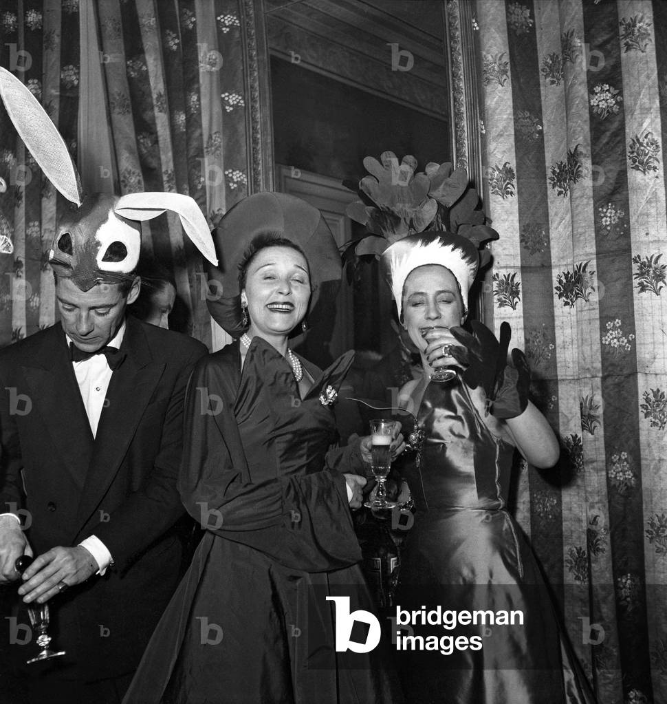 Elsa Schiaparelli Dressed As A Radish , With Mrs Winsonr Dressed As A Tomato at Four Seasons Fancy Dress Ball The Gentleman Seems To Be Dressed As A Rabbit March 24, 1949 (b/w photo)