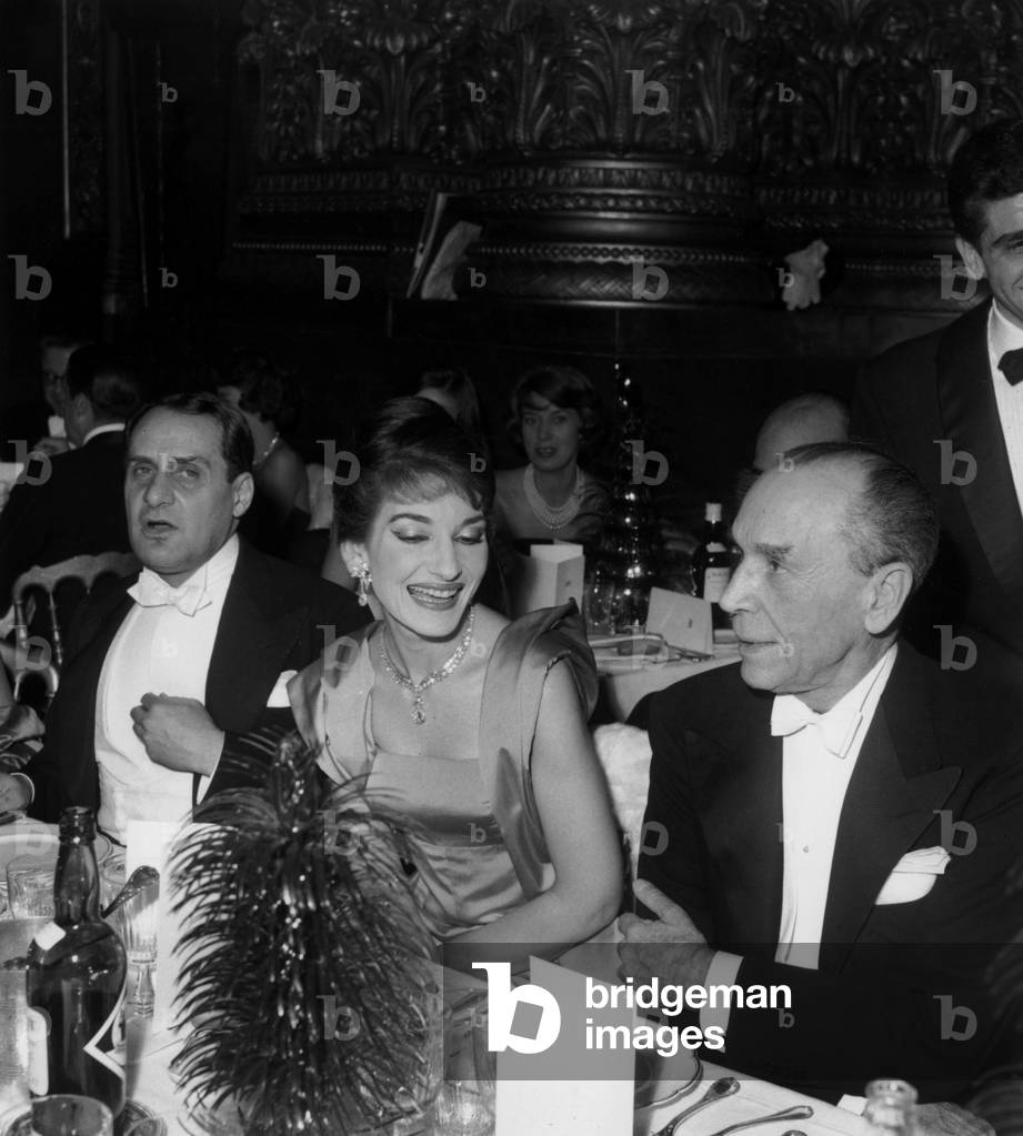 Diner at Paris Opera House : L-R : Herve Mille, Maria Callas (With Jewels By Van Cleef Et Arpel) and Jean Prouvost December 20, 1958 (b/w photo)