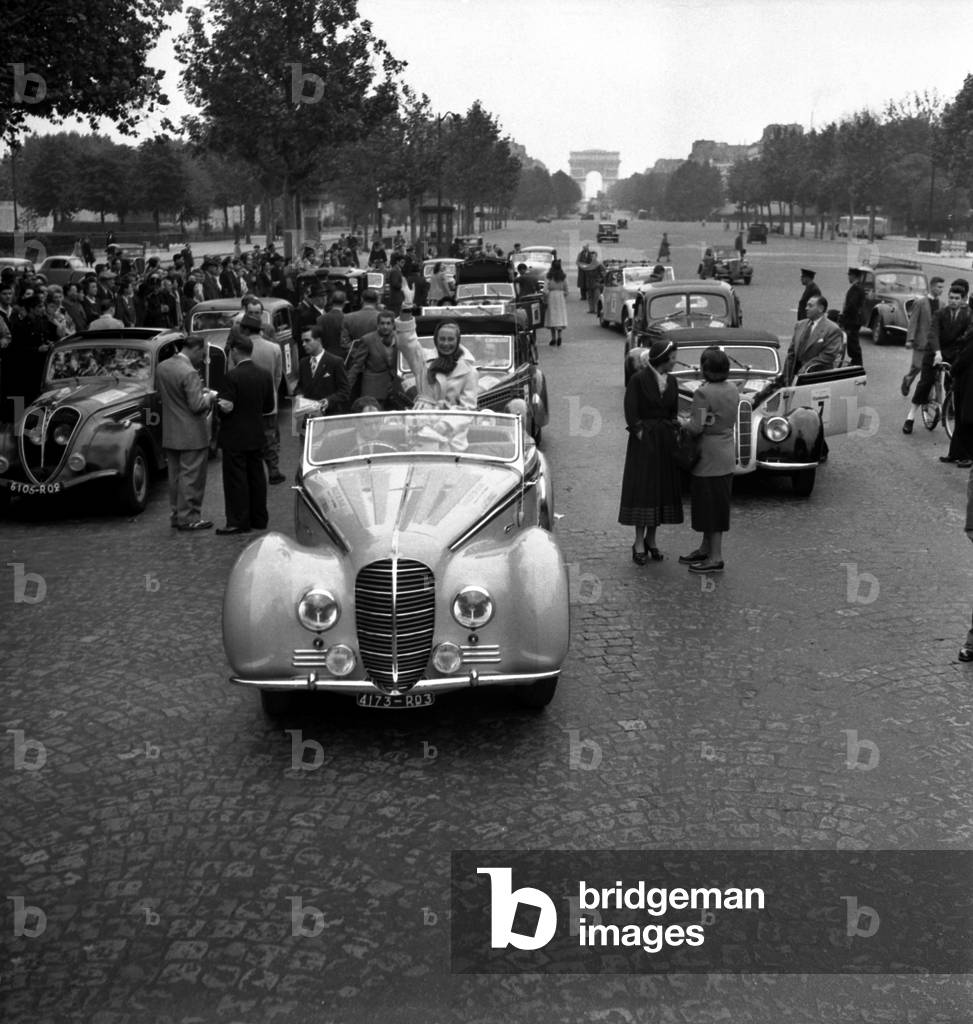 Paris-Anet Rallying on The Champs Elysees With Michele Morgan, July 11, 1948 (b/w photo)