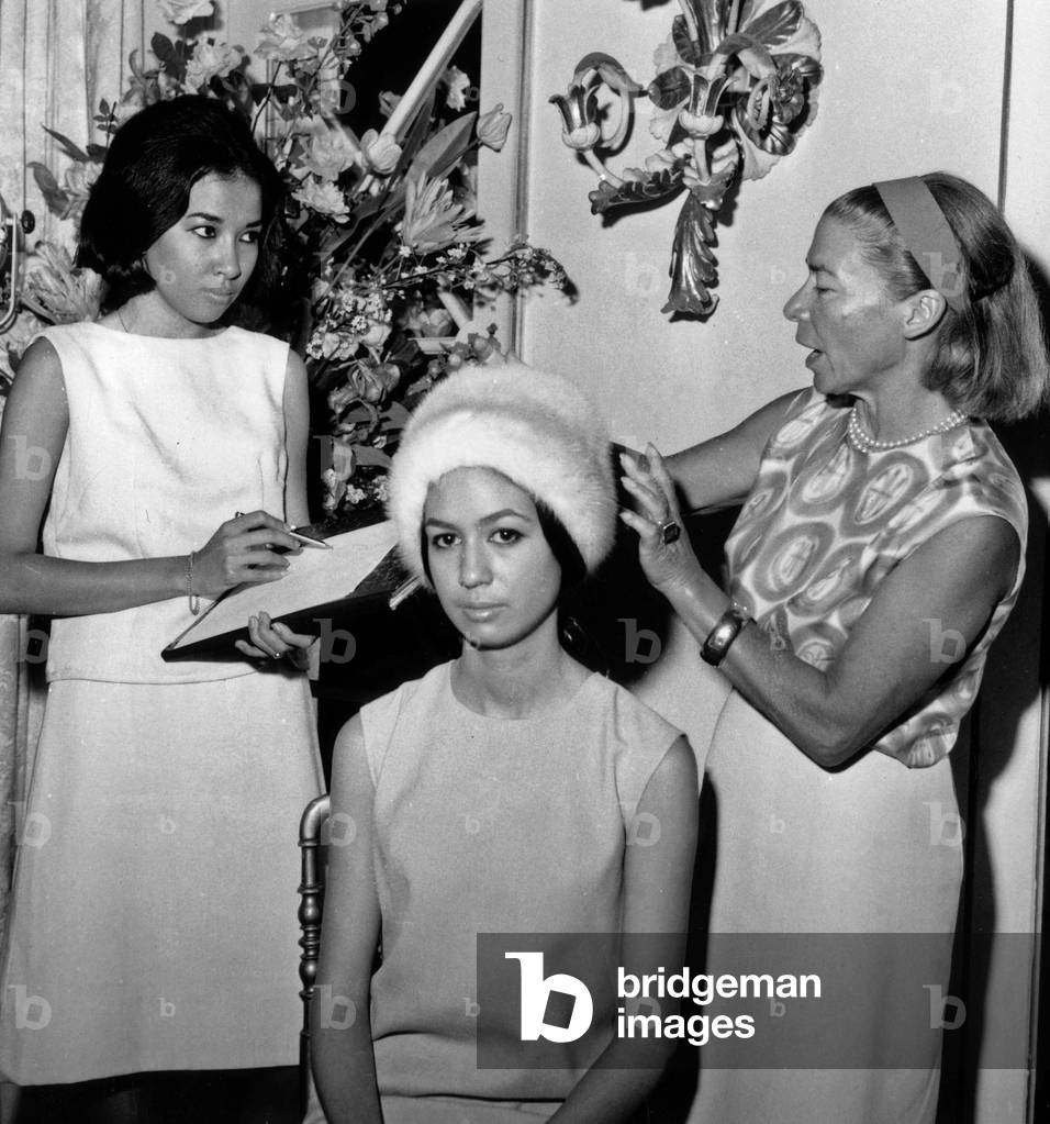 Madame Carven With Model and Assistant For Preparation of New Collection July 21, 1964 (b/w photo)