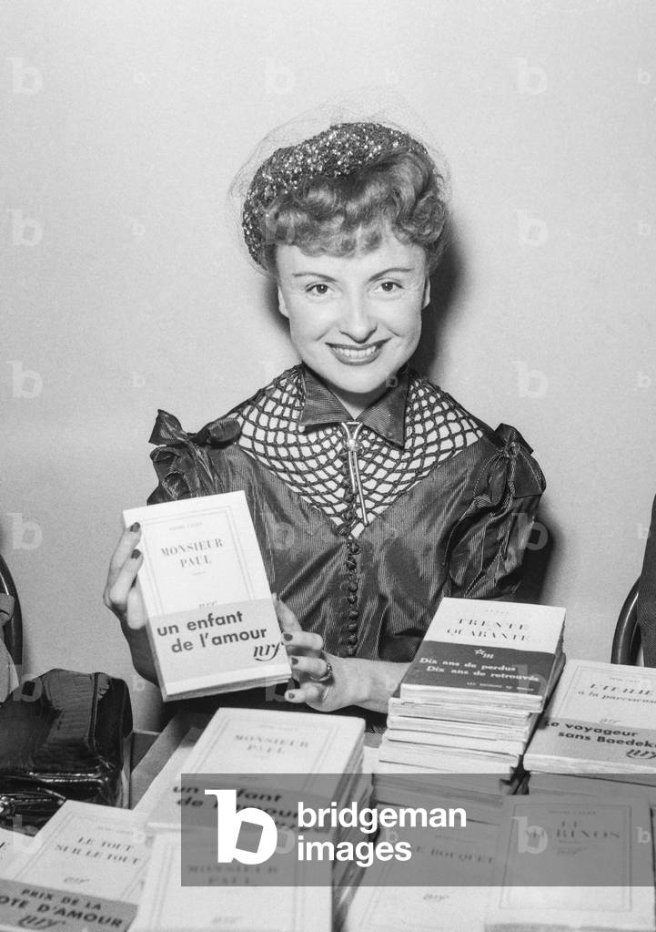French actress and writer Odette Joyeux at the Pen Club in Paris on December 14, 1950 (b/w photo)