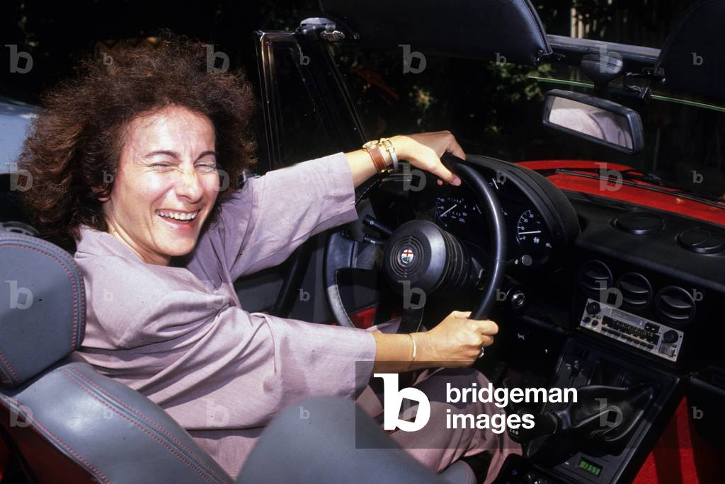 French Singer Marie Paul Belle in Holidays August 16, 1989 at The Wheel of Convertible Car (photo)