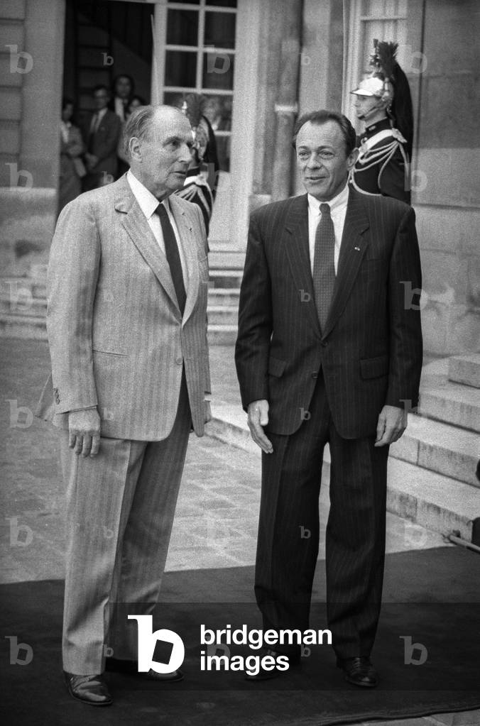 French president Francois Mitterrand with prime minister Michel Rocard for a lunch at the Hotel Matignon, Paris, May 9, 1989 (b/w photo)