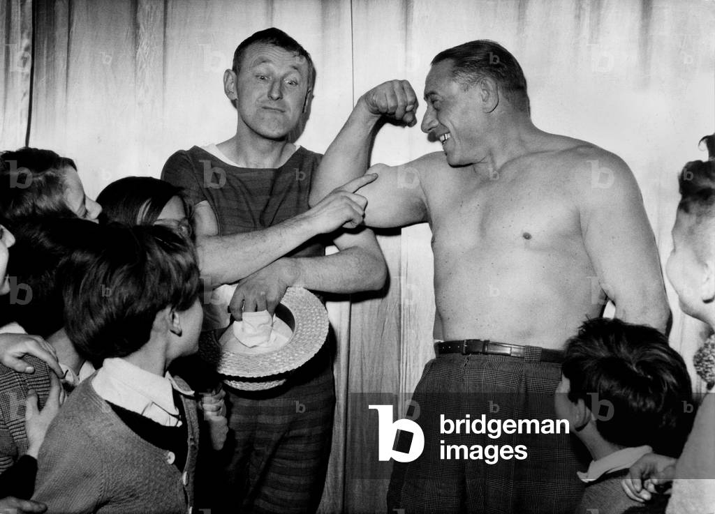 Bourvil and Charles Rigoulot With Children Before The Last Rehearsal of 'M¿Sieur Nanar' By Bruno Coquatrix and Jean Jacques Vital. Paris, Theatre De L'Etoile, December 21, 1950 (b/w photo)