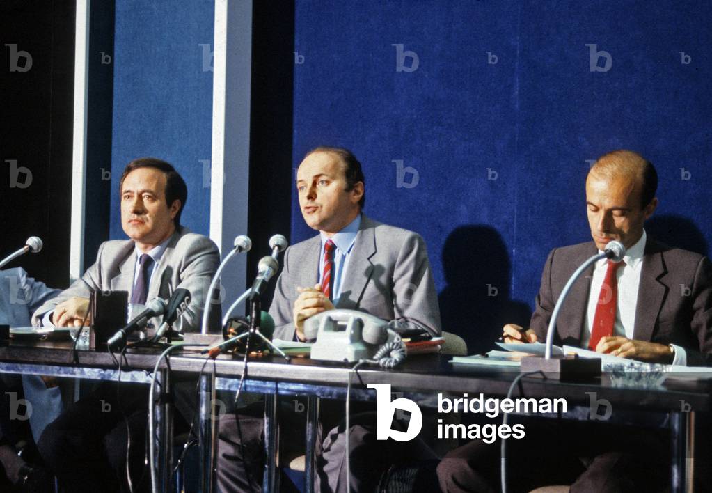 Jean Tiberi (Departmental Secretary of the Federation Rpr De Paris), Jacques Toubon (Secretary General of the Rpr) and Alain Juppe (National Secretary of the Rpr in charge of Economic and Social Recovery) During a Press Conference Presentating the Book “Renewal” of the Rpr Project on June 17, 1985 In Vincennes (b/w photo)