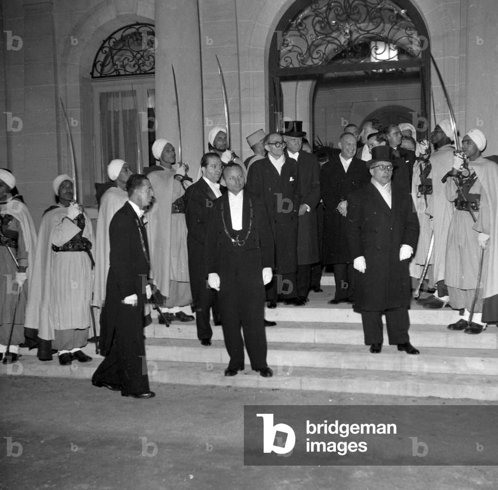 Le voyage du Sultan du Maroc en France A Paris, Ici au Diner A Bagatelle With M. Giaccobi, M R. Schuman, M Parodi And P.O. Lapie October 14, 1950 (b/w photo)