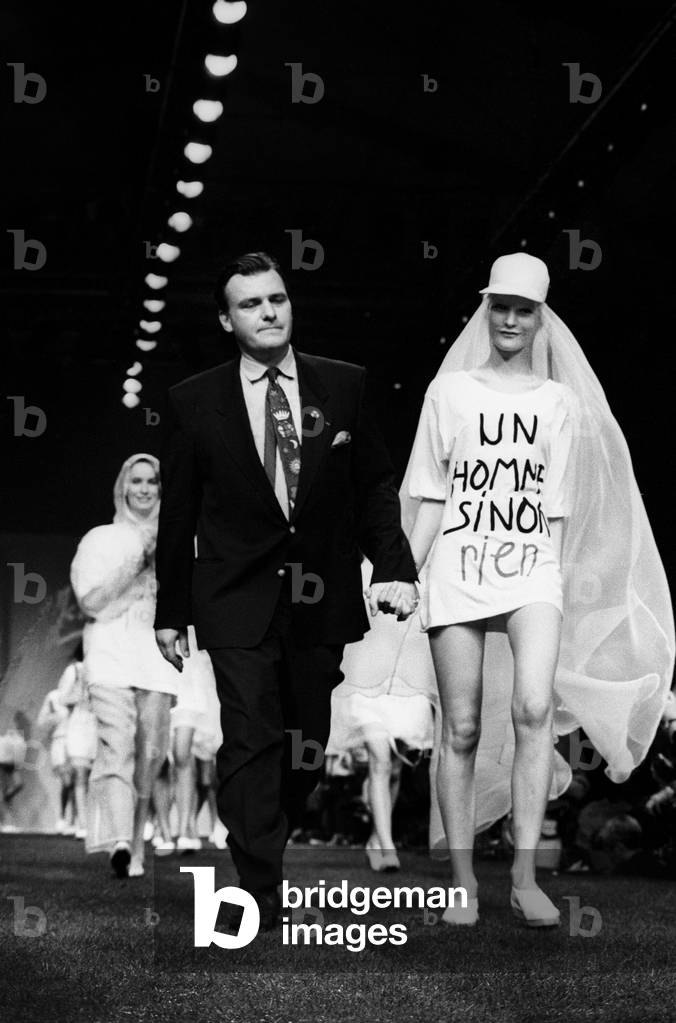Designer Jean-Charles De Castelbajac and One of his Models during Fashion Show For Summer-Spring Collection October 19, 1990 (b/w photo)