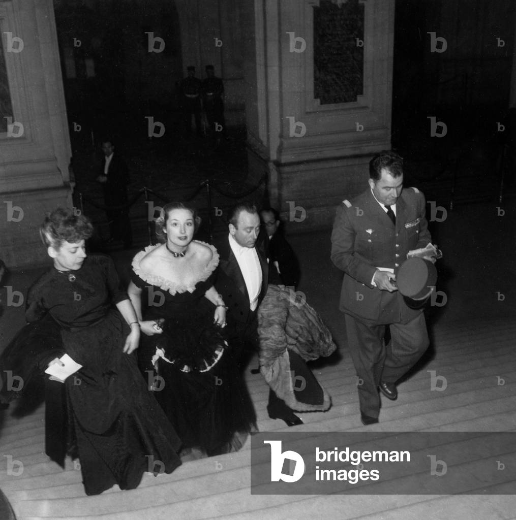 L-R: Mrs Grossin, Mrs De Bry and her Husband Michel De Bry and French General Paul Grossin at Paris Opera on May 16, 1947 (b/w photo)