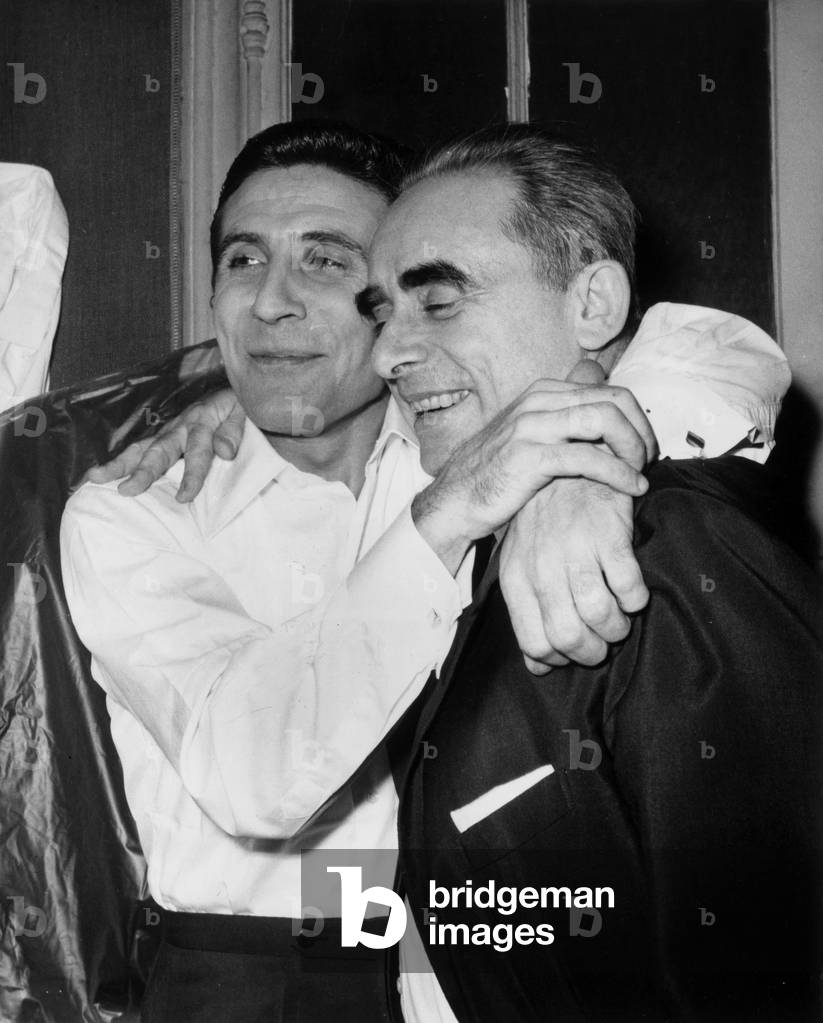 French Singer Gilbert Becaud Congratulate Georges Clouzot in Paris, November 20, 1964 (b/w photo)