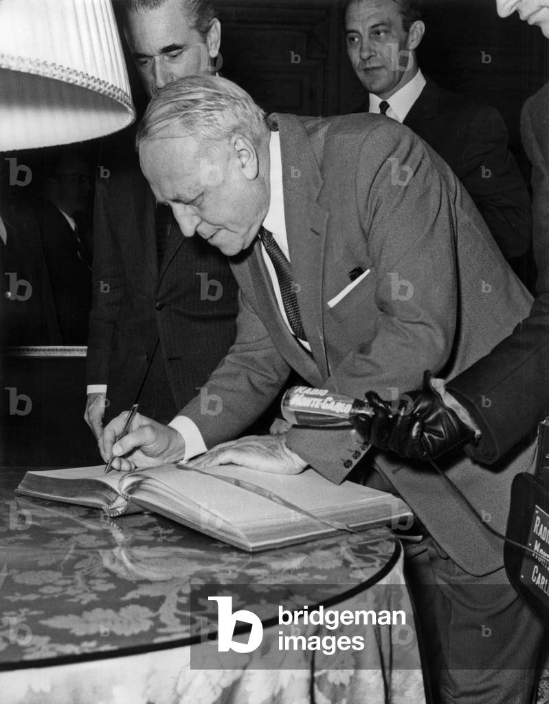 Valerian Zorinne, Soviet Ambassador in France, Signing Golden Book of Bordeaux, France, Under Look of Mayor Jacques Chaban-Delmas (L) and Tougoulev December 22, 1969 (b/w photo)