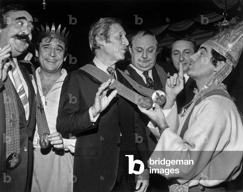 Jean Sablon Is Made Knight of The Order of Suspenders By Roger Pierre in Presence of Moustache (Francois-Alexandre Galepides), Jean Marc Thibault, Pierre Doris and Jean Collaert, in A Cabaret in Paris, December 2, 1970 (b/w photo)