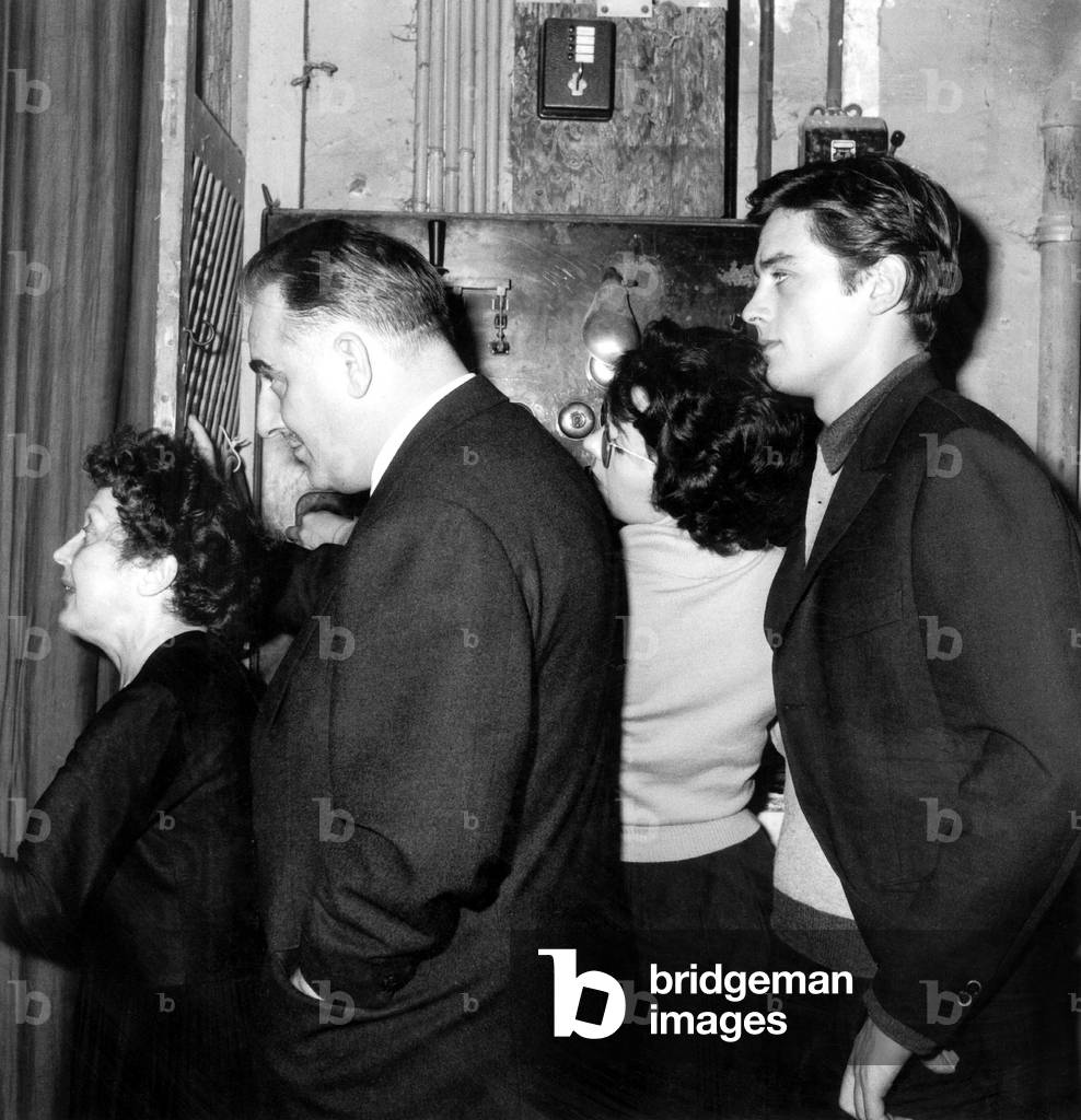 Edith Piaf in The Wings With Bruno Coquatrix and Alain Delon November 21, 1959 (b/w photo)