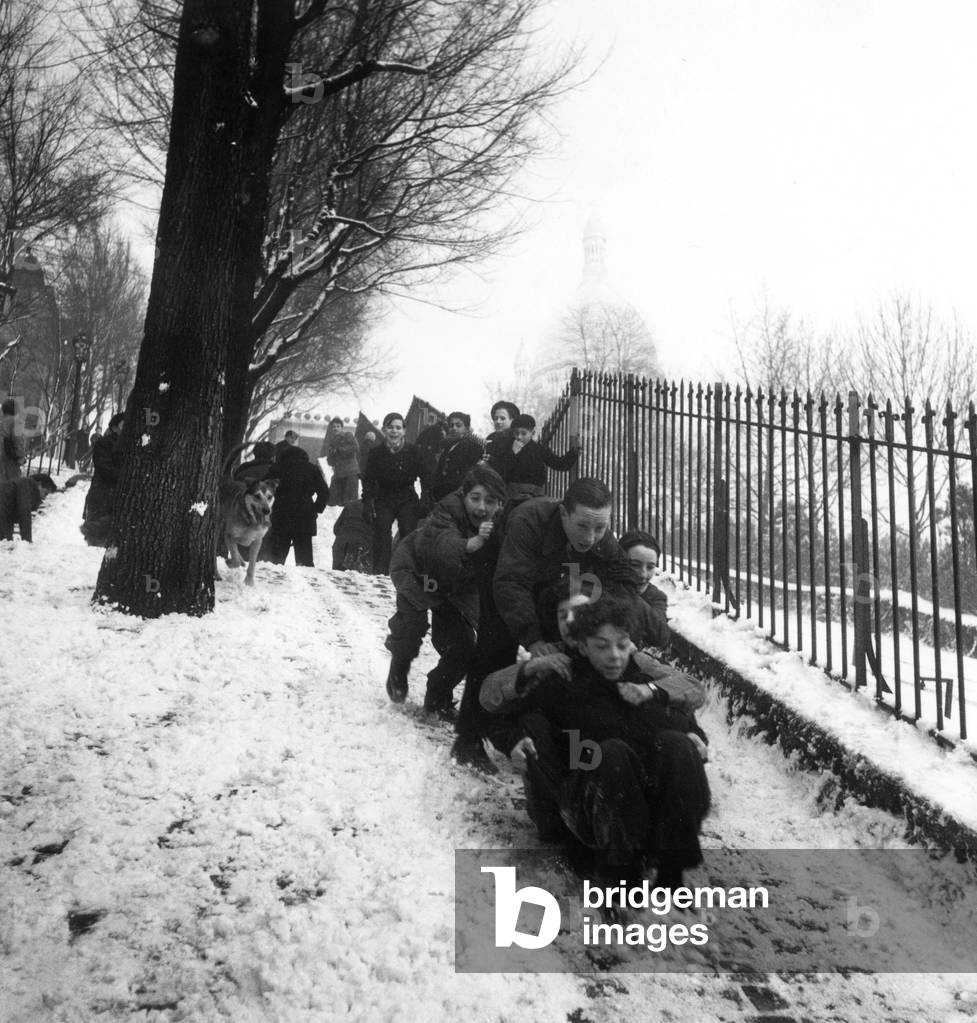 Children Going Tobogganing in Snwo in Montmartre, Paris, February 1St, 1947 (b/w photo)