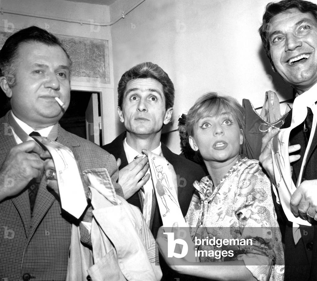 Annie Cordy Giving Ties To Ean Richard, Marcel Amont and Felix Marten Who Congratulate her For Premiere of her Show in Paris February 19, 1965 (b/w photo)