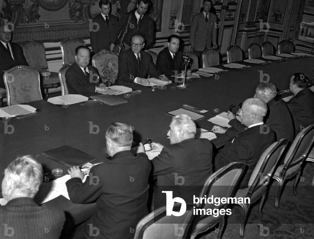 Robert Lacoste, Guy Mollet and Francois Mitterrand and the members of the Rights Protection Committee and freedoms in Algeria, May 10, 1957, Paris (b/w photo)