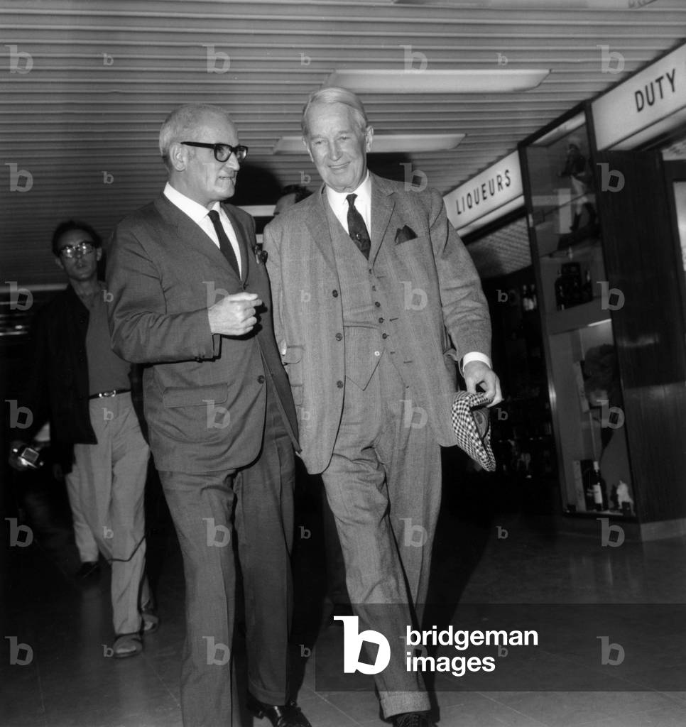 Georges Cravenne Welcoming Singer Maurice Chevalier at Orly Airport, Paris, September 10, 1968 (b/w photo)