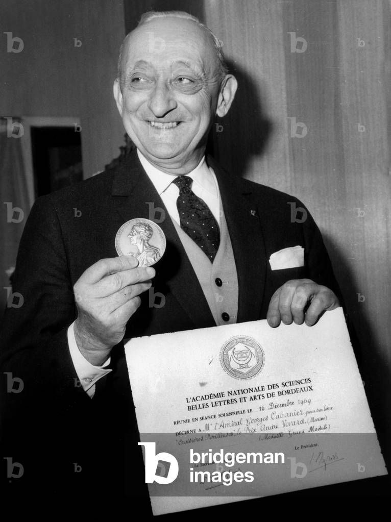 Admiral Georges Cabanier With The Medal And Diplome Of The Andre Vovard Award Decerne By The National Academy of Sciences For His Book Cruises Perilleuses February 17, 1970 (b/w photo)