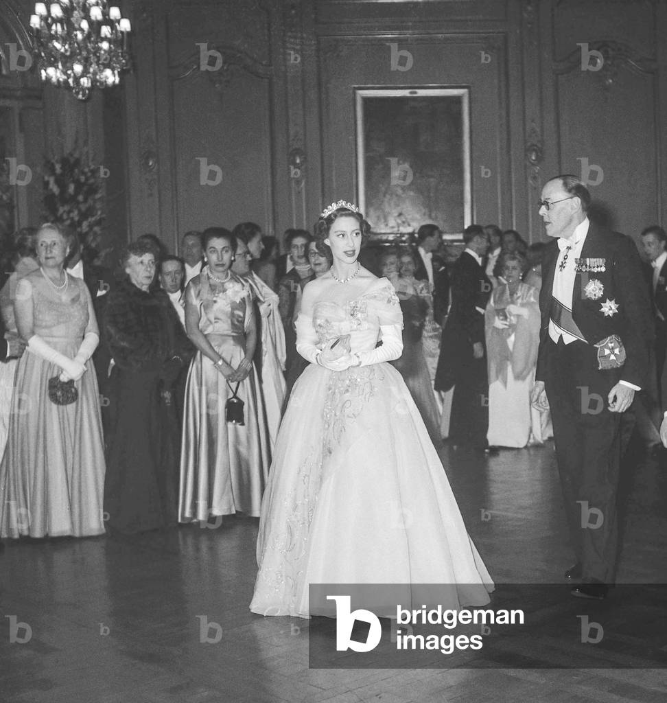 Ball given at the Cercle Interallie in Paris at time of the private stay of Princess Margaret of England in Paris, November 21, 1951 : Princess Margaret with Oliver Harvey (b/w photo)
