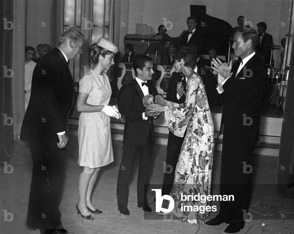 Given of Golden Whip By Audrey Hepburn To Yves Saint Martin With Mel Felrer on August 21, 1967 (b/w photo)