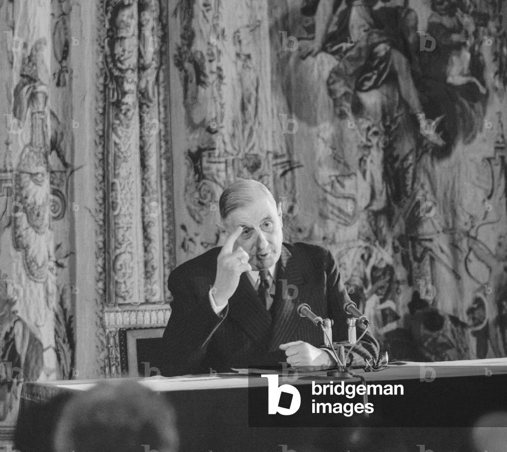rench president Charles de Gaulle during a press conference at the Elysee, Paris, March 25, 1959 (b/w photo)