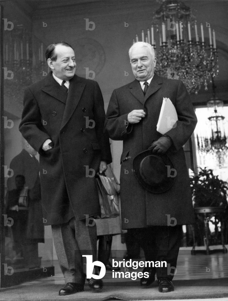 Andre Malraux, French Minister of Culture and Louis Joxe, French Minister of Administrative Reform, Are Leaving Elysee Palace in Paris on December 8, 1965 (b/w photo)