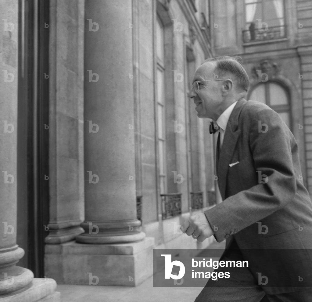French Industry minister Jean-Marcel Jeanneney arriving at the Elysee, Paris, to attend the council of ministers, August 24, 1960 (b/w photo)