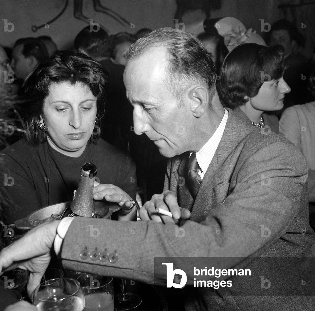 Actress Anna Magnani With French Novelist Pierre Bost at 1St May Party In1949 With Bottle of Champagne (b/w photo)