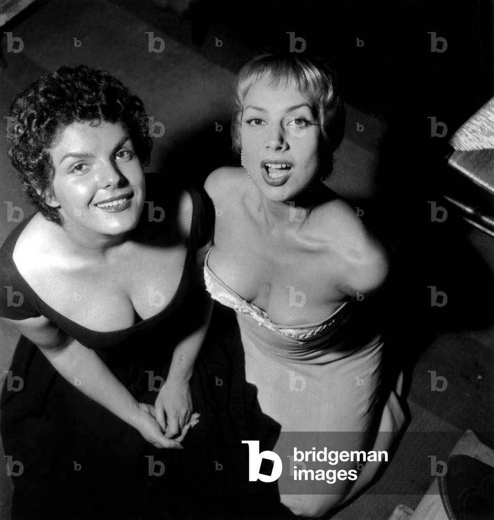 Claude Sylvain and Daniele Lamar Winner of Party For Most Beautiful Cleavage on July 29, 1954 (b/w photo)