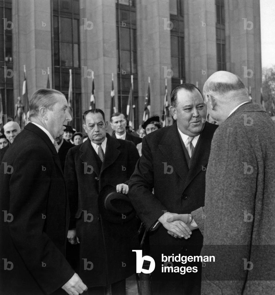 Norvegian Politician Trygve Halvdan Lie, Secretary-General of The United Nations, Receiving From Robert Schuman The Golden Key at The Palace of Nations, Geneva, October 14, 1951 (b/w photo)