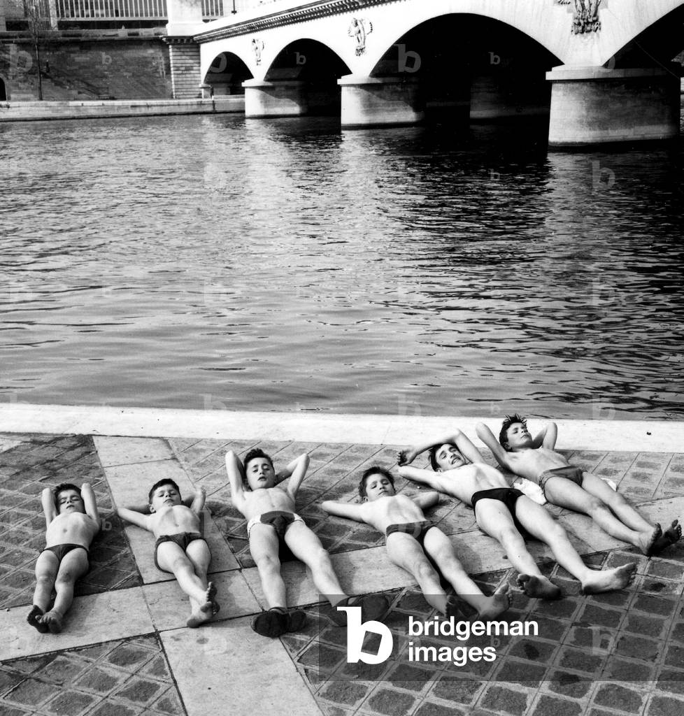 Children Getting A Tan on The Banks of River Seine in Paris March 26, 1956 (b/w photo)