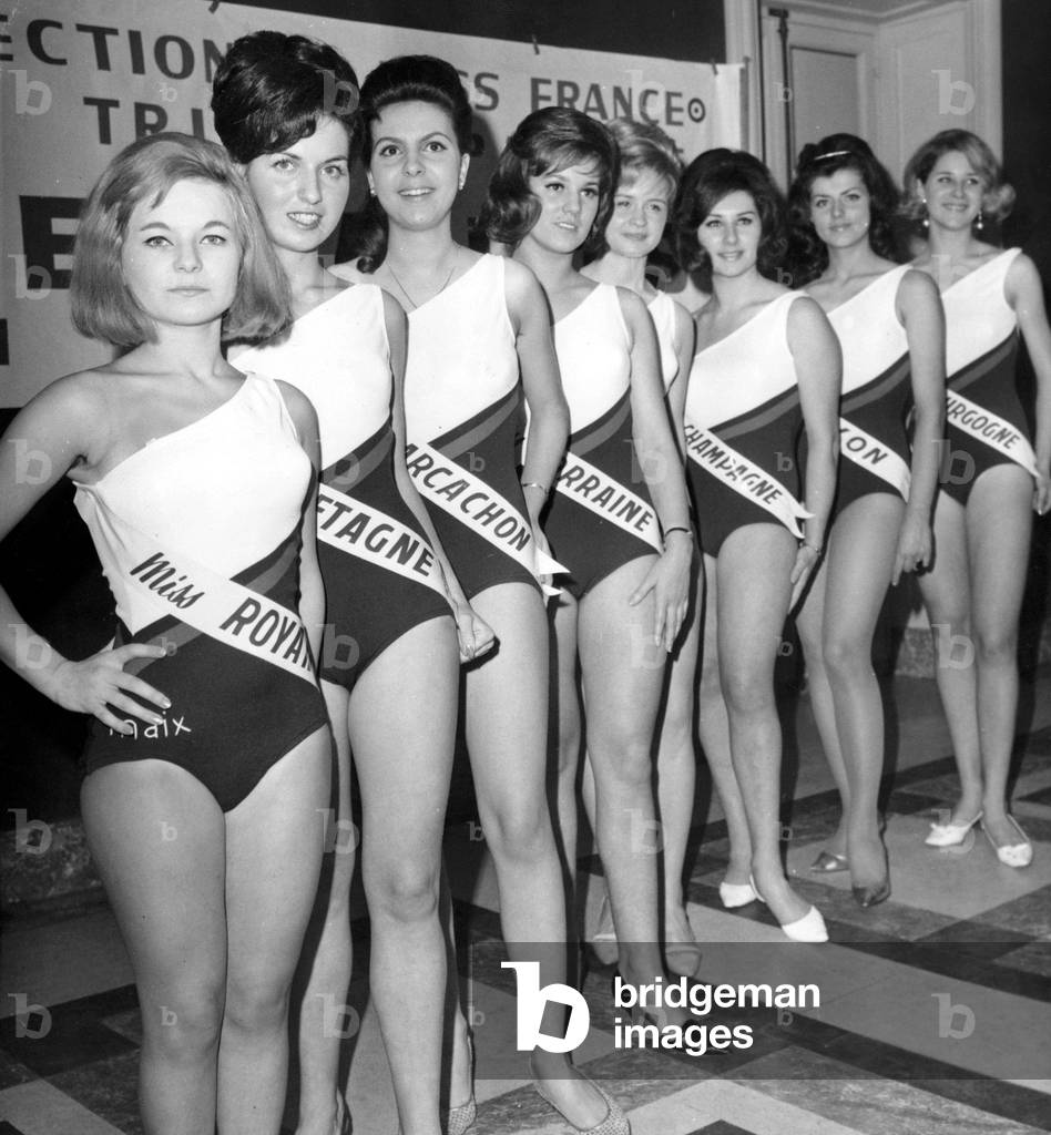 The Candidates To The Miss France 1965 Beauty Contest: L-R Annick Delorme, Chantal Le Coz, Josette Venton, Sylvie Reichert, Annie Delabre, Jocelyne Billot, Gisele Aupetit, Christine Sibellin (Future Miss France 1965), Maria Dornier Et Liliane Bouvet December 18, 1964 (b/w photo)