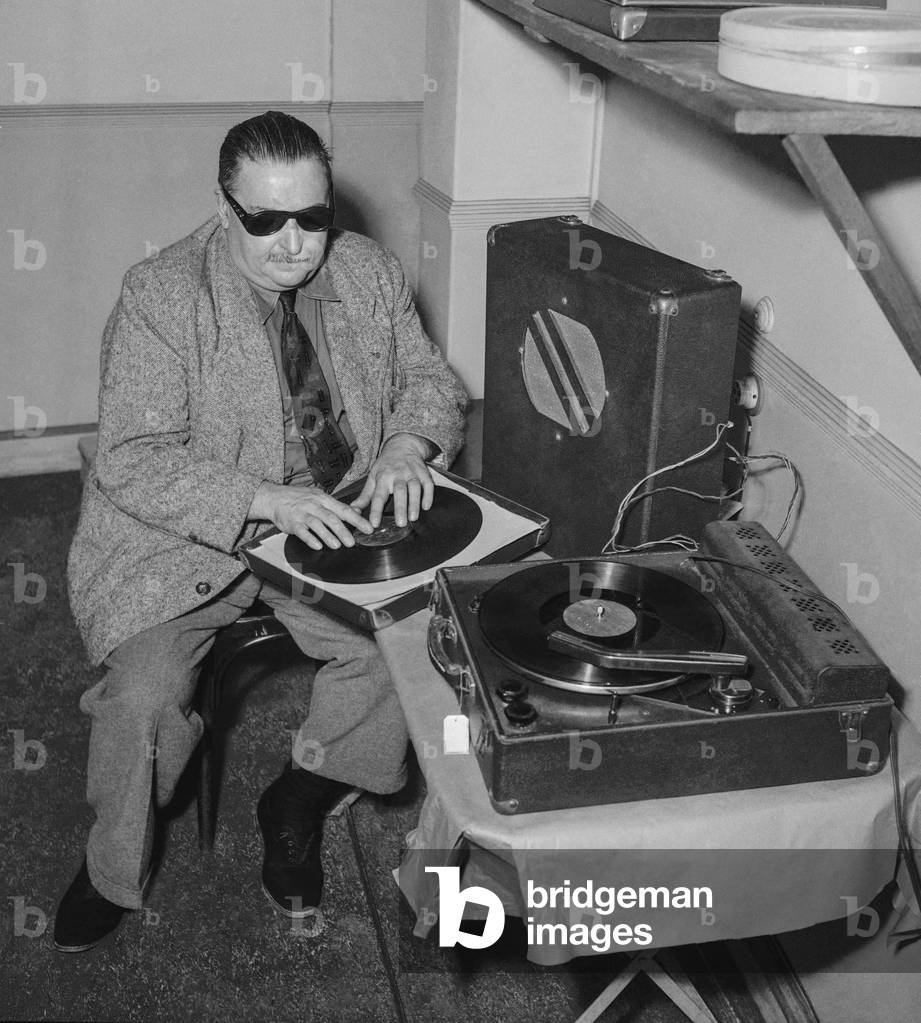 Demonstration of audiobooks (on discs) for blind people, Paris, August10, 1950 (b/w photo)