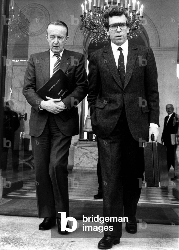 Pierre Arpaillange, French Minister of Justice, and Pierre Joxe, French Interior Minister, Leaving Elysee After Council of Ministers, Paris, February 8, 1989 (b/w photo)