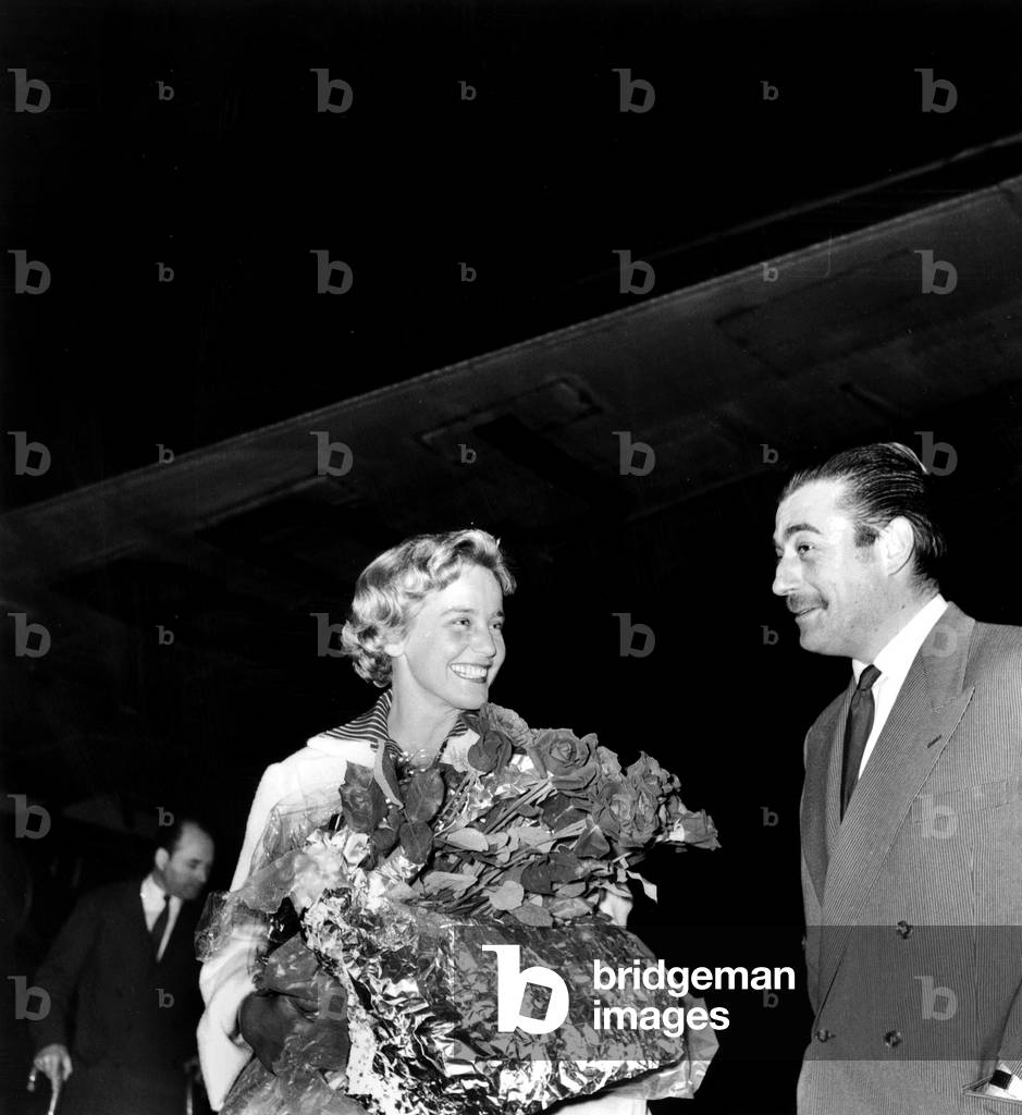 Actress Maria Schell Arriving in Paris Airport and Greeted By Actor Francois Perier To Shot Film Gervaise July 01, 1955 (b/w photo)