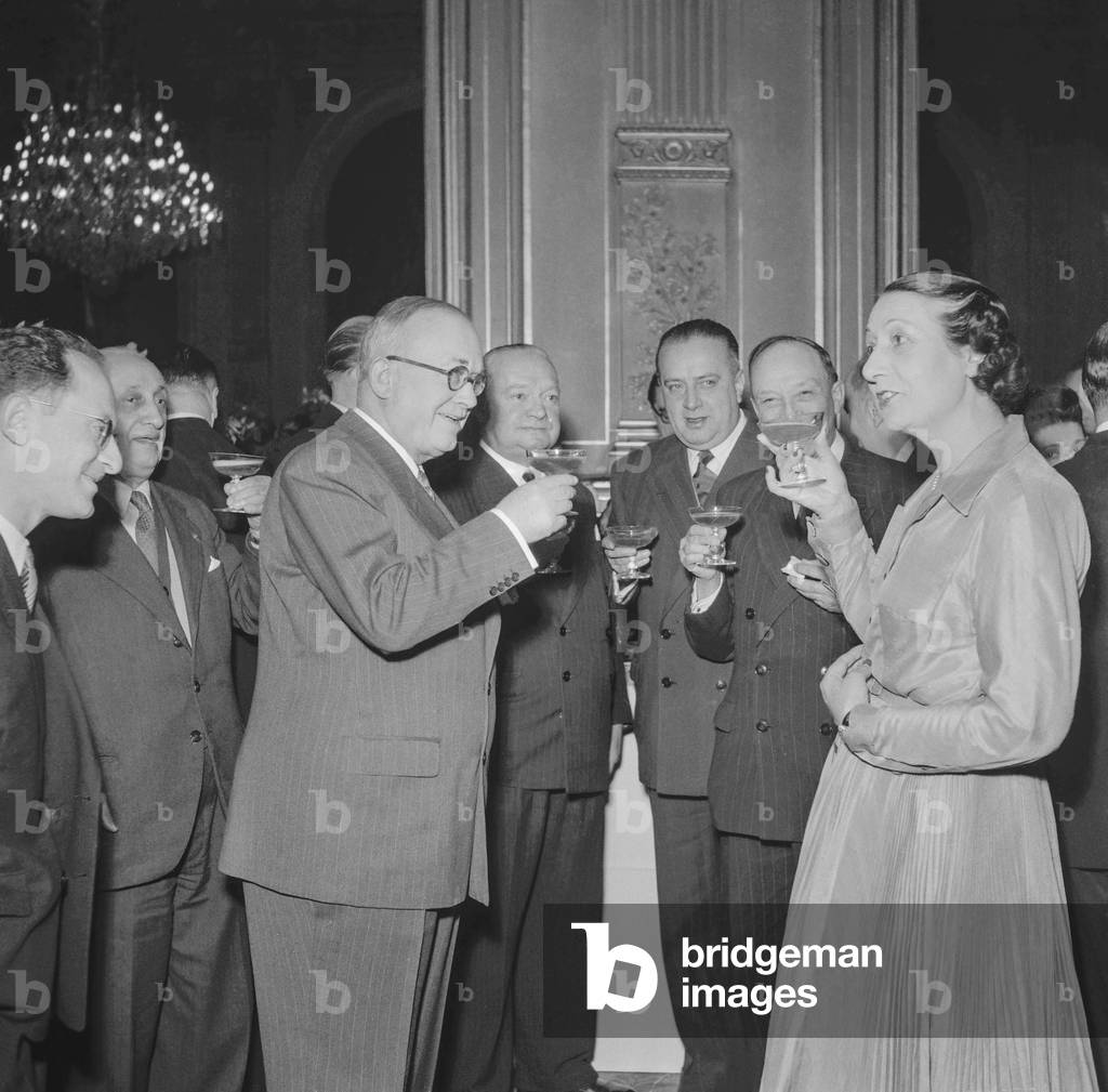 New year at the Elysee, Paris, December 30, 1950 : French president Vincent Auriol and his wife Michelle receiving the wishes of the journalists (b/w photo)