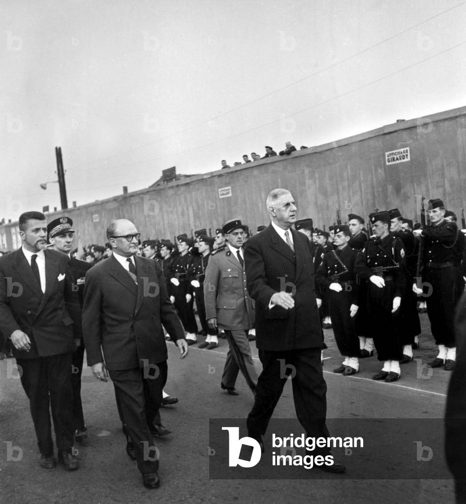 French President Charles De Gaulle Visiting Arras (France) Is Welcomed By Guy Mollet on September 25, 1959 here during Troops Review, in The Background Is Robert Buron, French Minister of Civil Engineering (b/w photo)