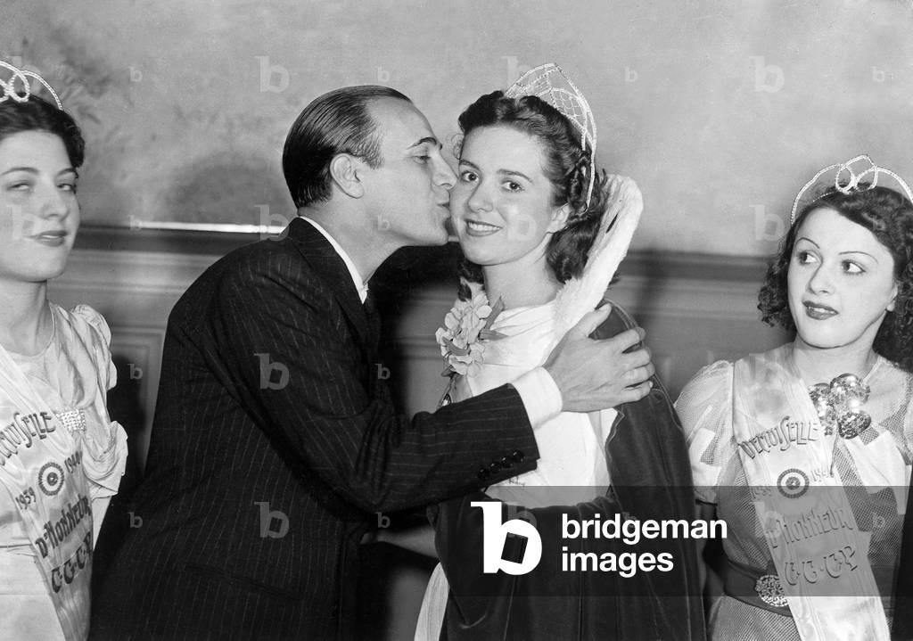 Singer Tino Rossi Kissing Corsican Queen of Beauty, 1939 (b/w photo)