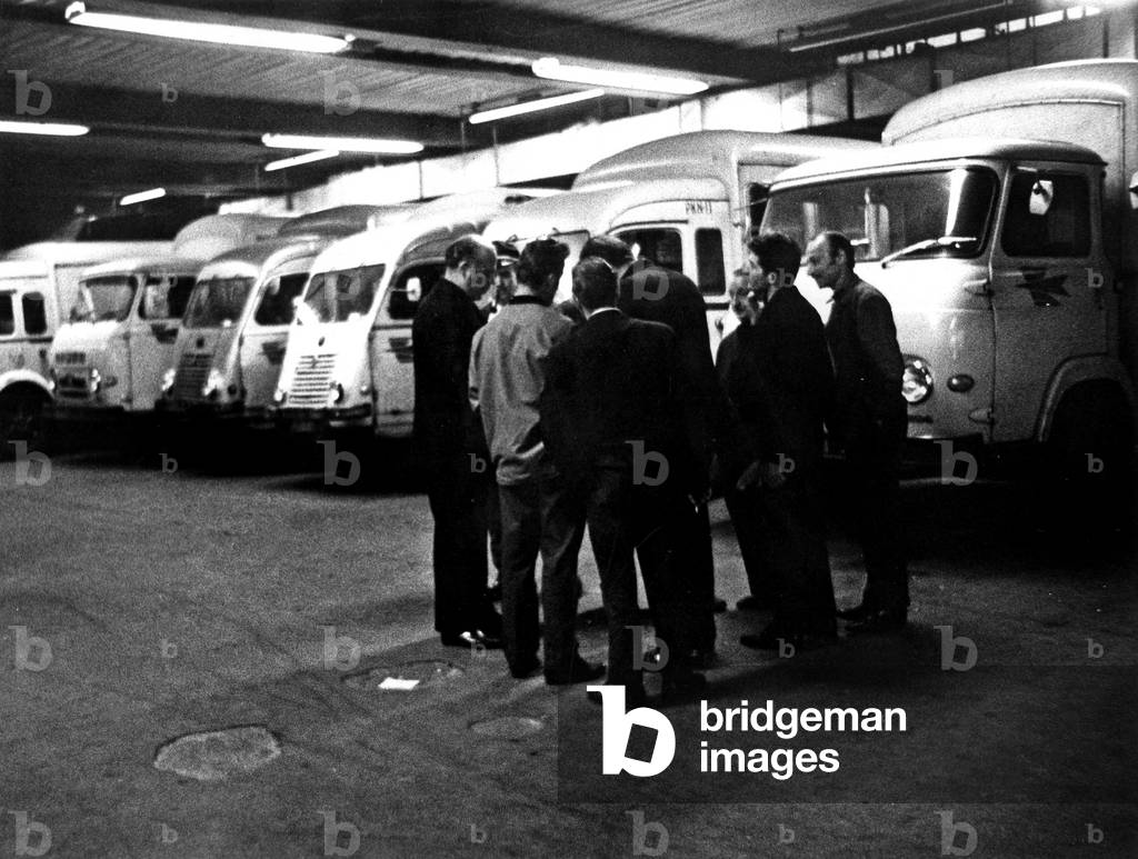 Drivers of Sorting Office in Paris Speaking Before Going at Work, June 6, 1968 (b/w photo)