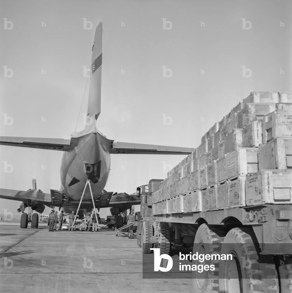 American F-100 Super Sabre plane is going to leave France, here at Chaumont airport, Janaury 7, 1960 (b/w photo)