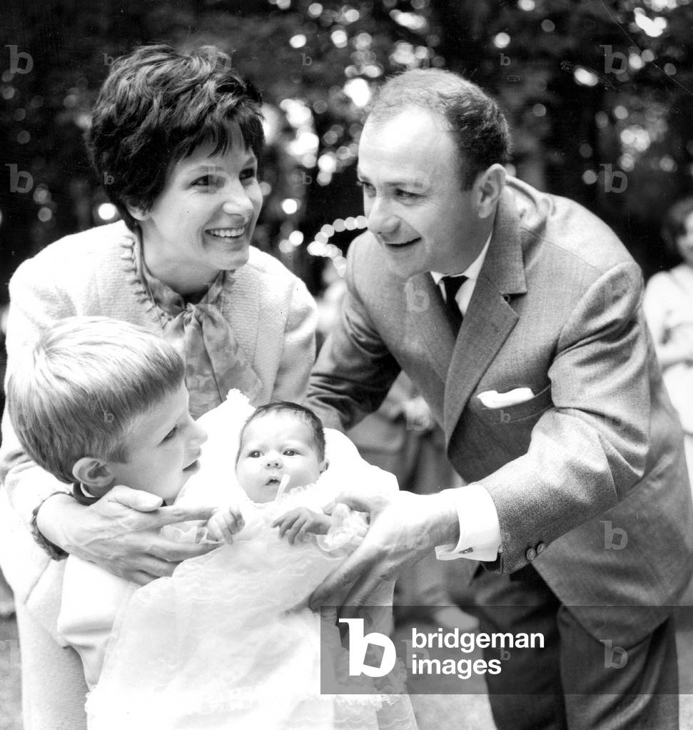 Fernand Raynaud With his Wife Renee Caron and Son Pascal during Christening of Daughter Francoise June 18, 1964 (b/w photo)