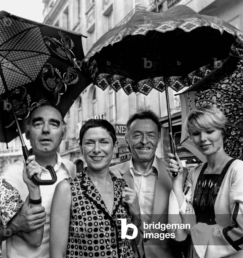 Les Maries De Saint Medard And Les Nouvelles Umbrellas Barberouse Catherine Sauvage And B Lavalette In Paris June 9th 1976 (b/w photo)
