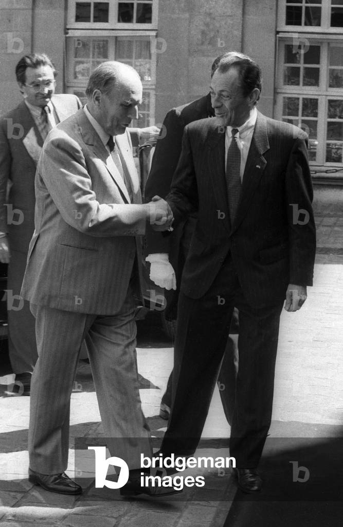 French president Francois Mitterrand with prime minister Michel Rocard for a lunch at the Hotel Matignon, Paris, May 9, 1989 (b/w photo)