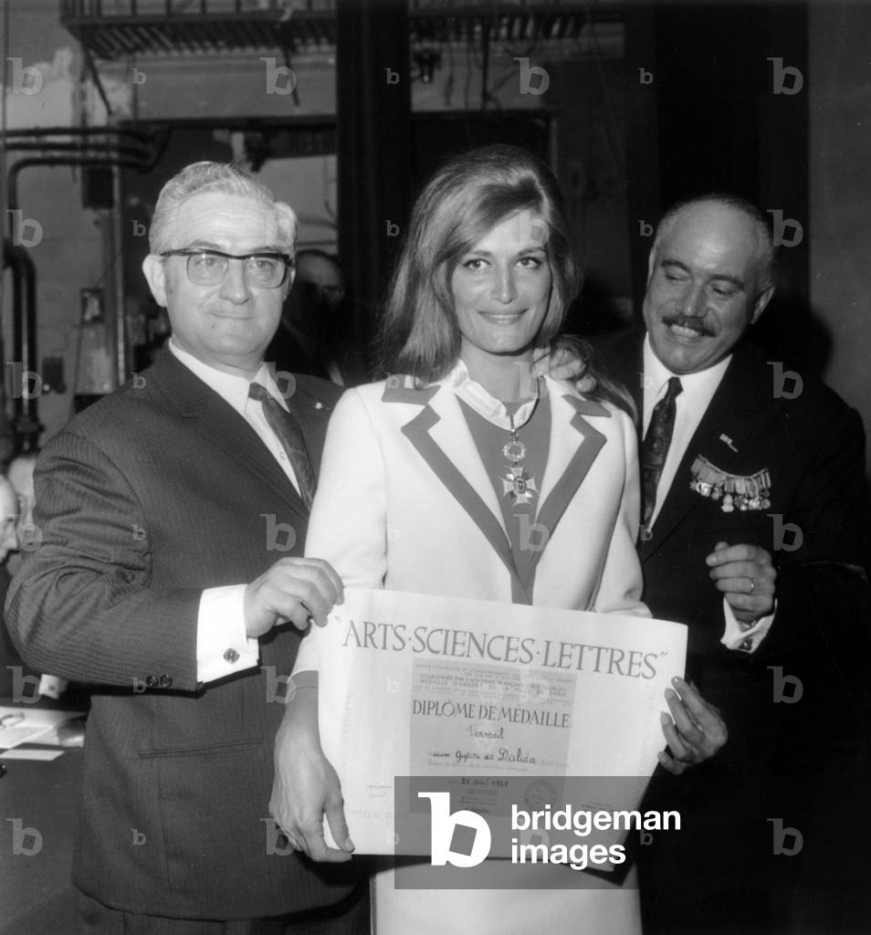 Roger Pinoteau Giving Dalida A Distinction, Paris, April 28, 1968 (b/w photo)