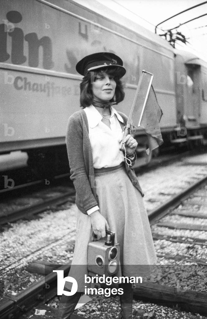 French singer Dani (Daniele Graule) as a station master during an exhibitionin a station in Paris, September 20, 1973 (b/w photo)