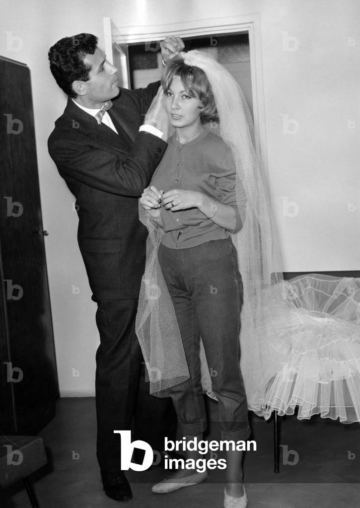 Roger Chaland With Dany Saval Dressing For The Film Asphalte, October 4, 1958 (b/w photo)