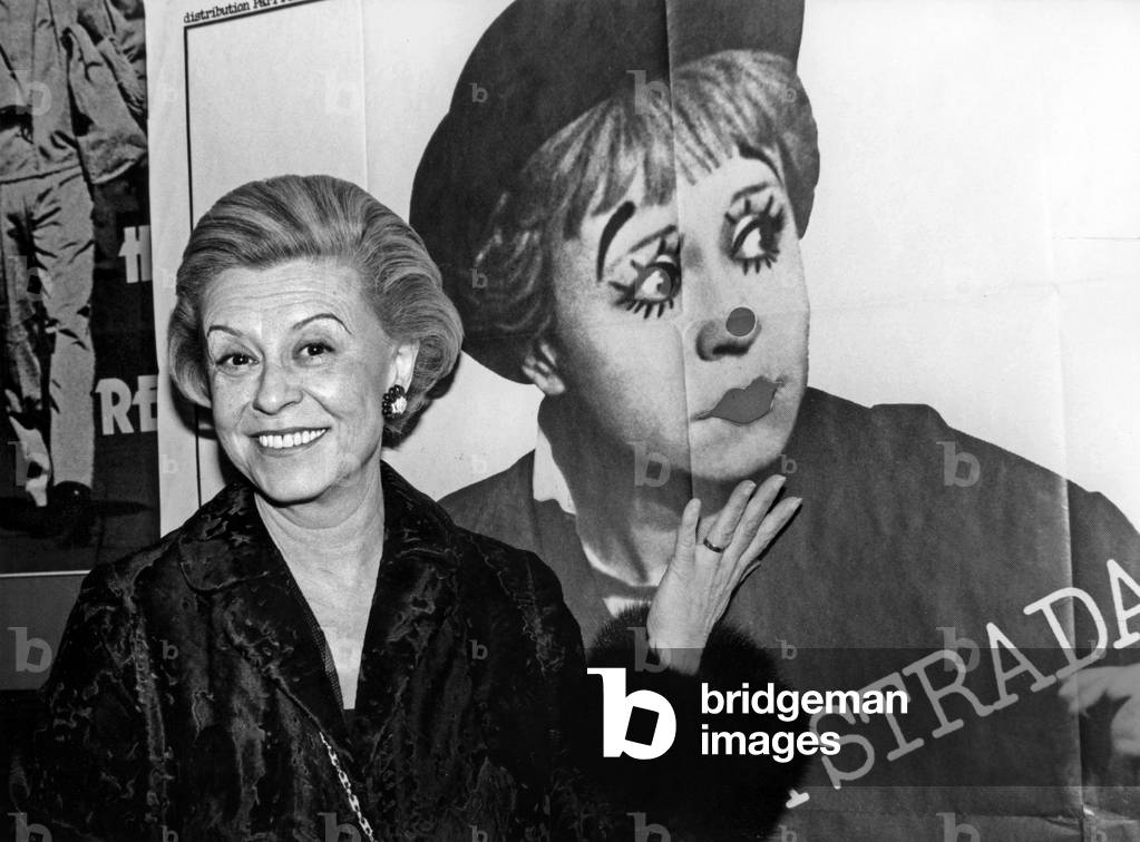 Giulietta Masina At The Cinema Balzac At The Champs-Elysees Here In Front Of A Poster The Representative In “La Strada” By Fellini At The Premiere On December 1, 1980 (b/w photo)